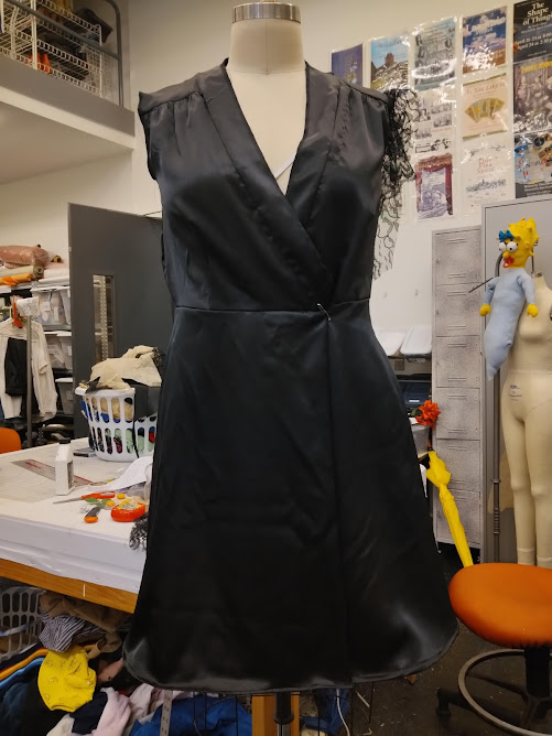 Spring 2022: Dress constructed by altering an existing pattern to fit the designer&rsquo;s rendering; mock-up shown here on a mannequin was then fitted on the actor and partially disassembled to add a lace overlay per the designer&rsquo;s request. Design by alex martin