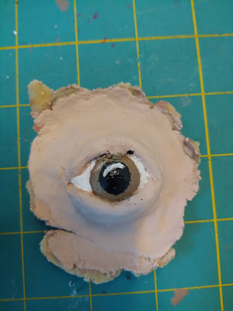 Spring 2022: Prosthetic created for class using monster clay, alginate, and gelatin. Painted to match my skin and eye color. Original design by me