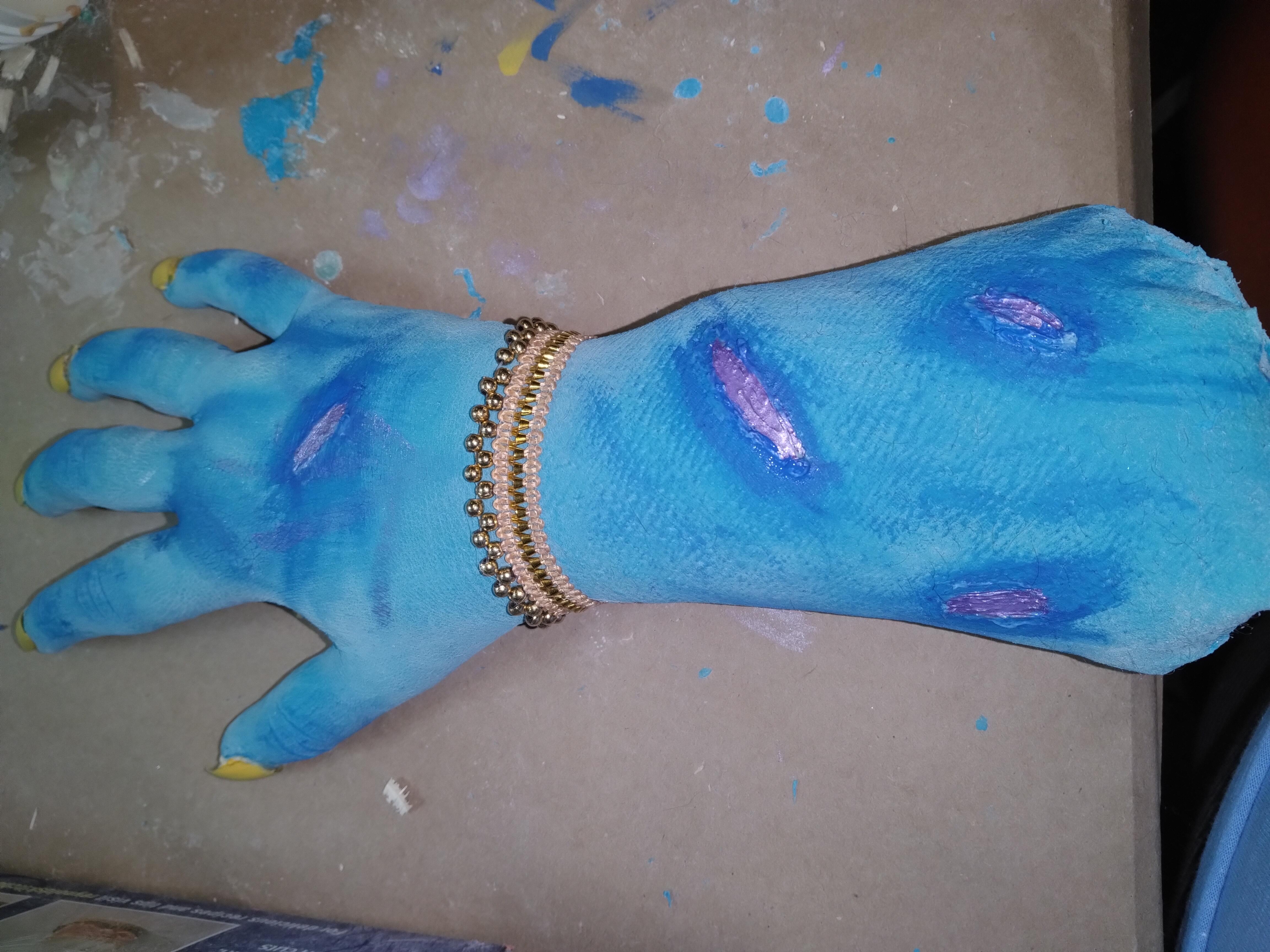 Winter 2022: Constructed a fake arm using liquid latex. The finished product after being stuffed.