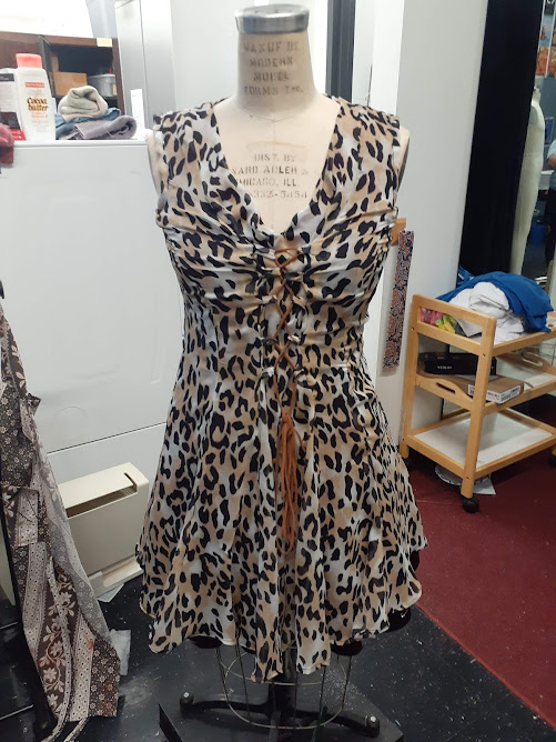 Fall 2021: Dress constructed by altering an existing pattern to be the shape needed for the garment; near-finished garment, pre-hem; Design by Miriam Patterson