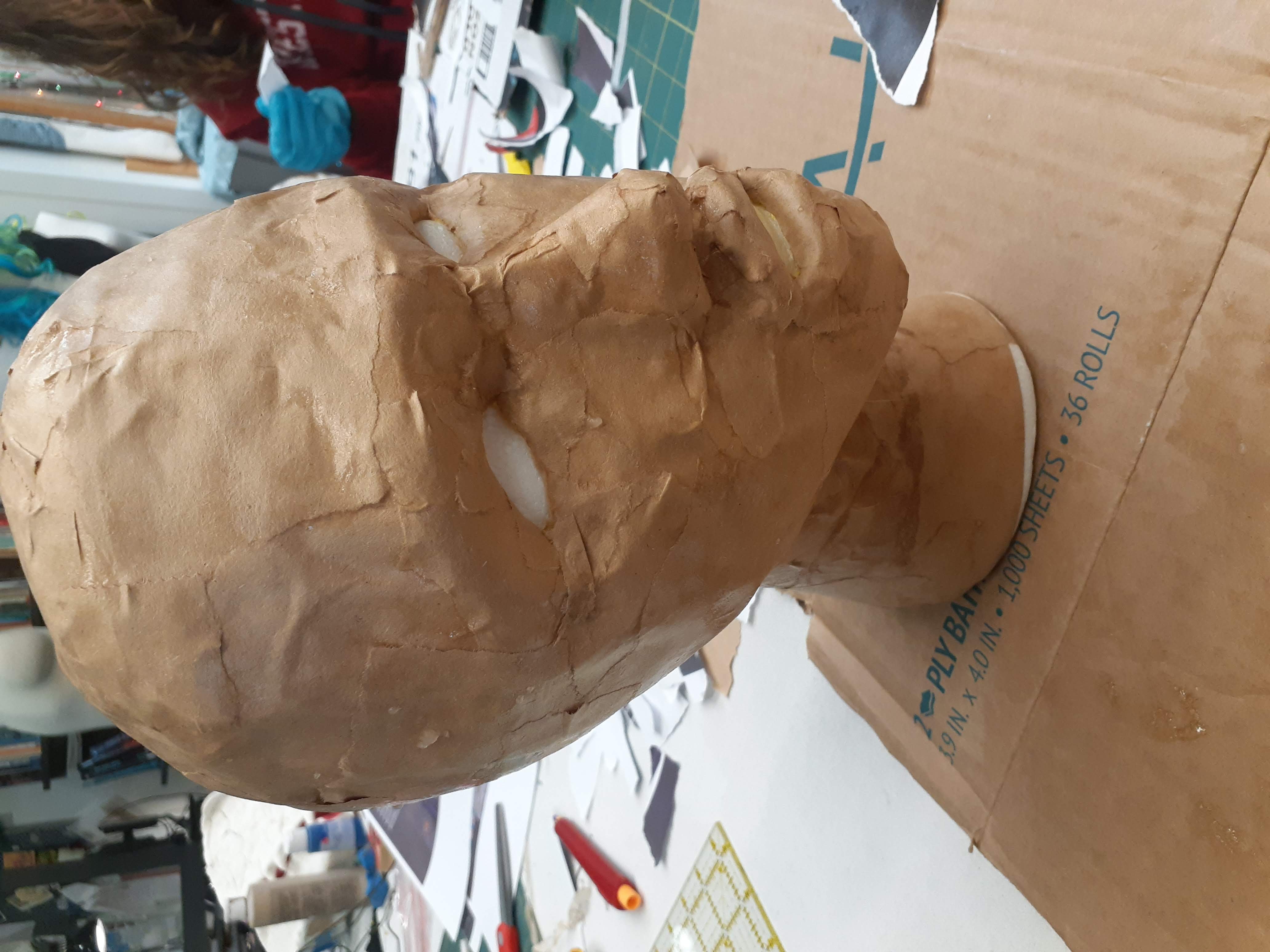 Zombie heads: Styrofoam mannequin heads were given shape with model magic clay, then papier mached to give an even surface to paint on